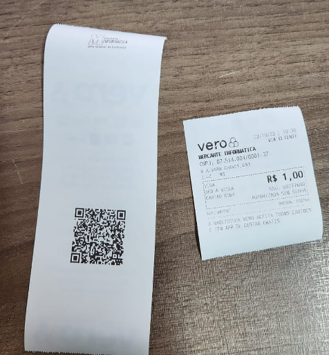 Exemplo de impressão saindo só com cabeçalho e QR Code Impressão incompleta com cabeçalho e QR Code